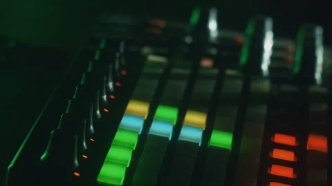 Dj Hand Spinning Regulators on Control Panel at electronic music festival Stock Footage 115577677