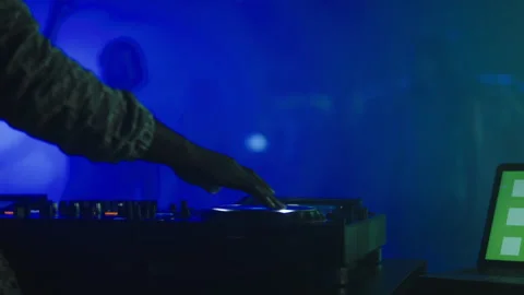 DJ hand turning with controller Stock Footage 170256576