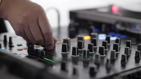 DJ Hands Adjusting Audio Mixer Controls Vídeos de archivo 323067591