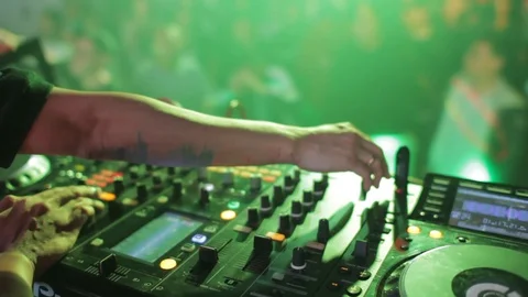 Dj Hands And Equipment During Night Club Party With Dancing People Stock Footage 89907155