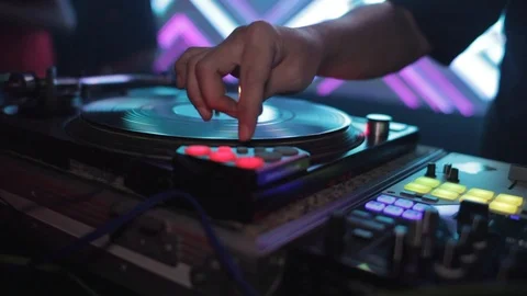 Dj Hands And Equipment During Night Club Party With Dancing People Video stock 89907359