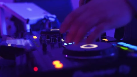 DJ hands controlling a music table. Close up. Stock Footage 182577787