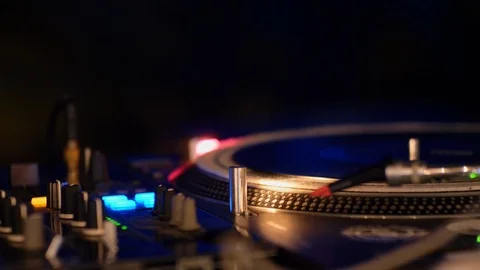DJ Hands Launch and Start to Mix Music on Vinyl Plate in Night Club at Party Stock Footage 114460222