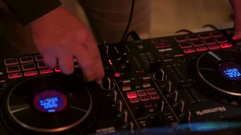 DJ hands mixing music on controller at nightclub in Izmir Turkey 8 dec 2023 Video stock 332116493