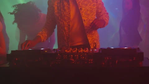DJ hands moving controls on mixing desk Stock Footage 170199143