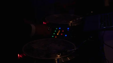 DJ hands operating his equipment in the dark. Stock-Footage 149076327