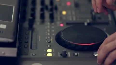 DJ hands over a desk working Stock Footage 60030414