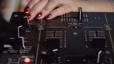 Dj hands playing on the mixing console Stock Footage 127196747