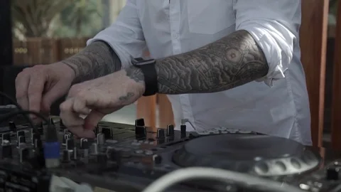 DJ hands on the remote Stock Footage 71468245