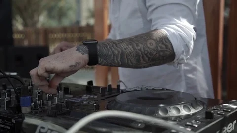 DJ hands on the remote. Slow motion Stock Footage 71504289