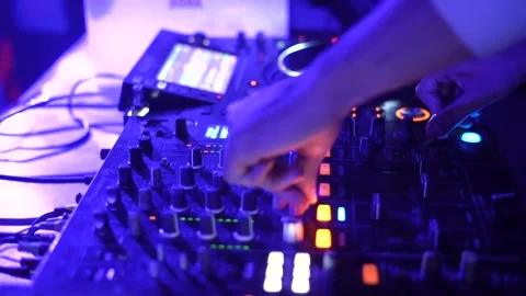 DJ Hands touching Buttons and Sliders Playing Electronic Music Stock Footage 245473853