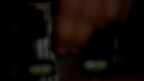 DJ hands turning knobs on the turntable. Dark environment, slow motion, 動画素材 94411558