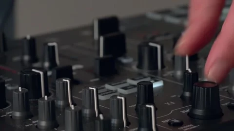 DJ mix electronic music using faders and filters Stock Footage 287178482