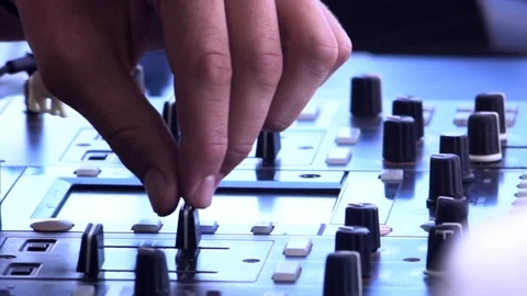 DJ mix tracks, play electronic music on pro audio mixing controller deck Stock-Footage 88623448
