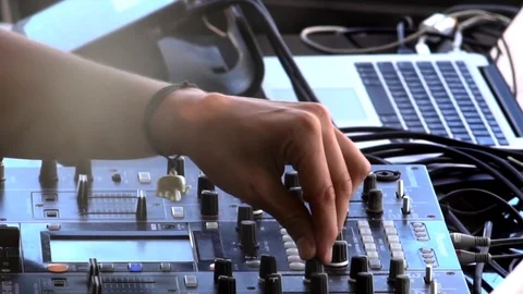 DJ mix tracks, play electronic music on pro audio mixing controller deck Stock-Footage 88623476