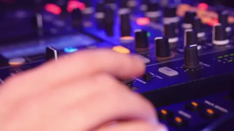 DJ Mixer Controller Close Up with Blurry Shallow Depth of Field Stock Footage 336810089