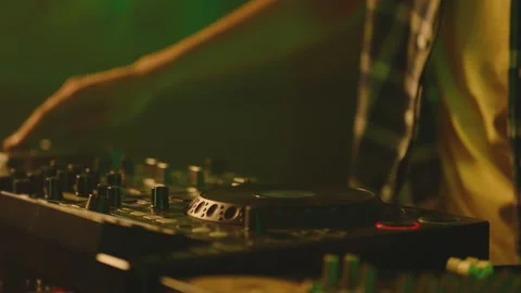 Dj Mixer Controller Desk . Night Club  Party. DJ  touching Buttons Playing Music Stock Footage 154065696