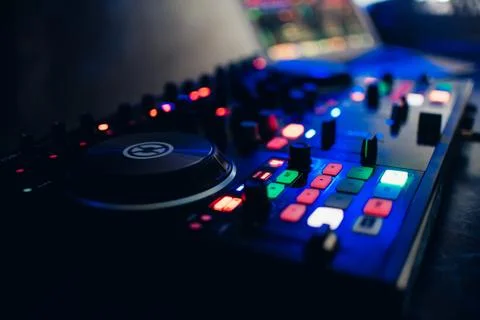DJ mixer controller panel for playing music in nightclub Stock Photos