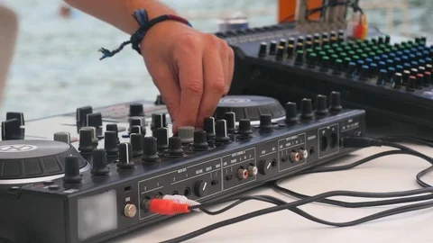 Dj mixes the track Stock Footage 106476269