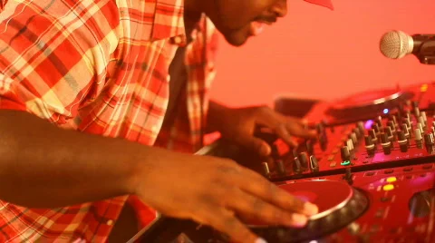 DJ mixing and talking into microphone 스톡 동영상 301112