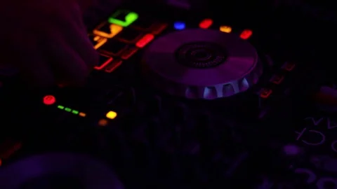 DJ mixing closeup of buttons Stock Footage 78559733
