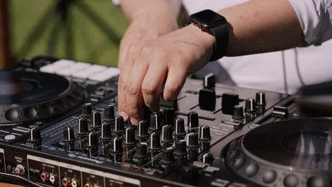 DJ Mixing Console with Hands in Motion Stock Footage 269508181
