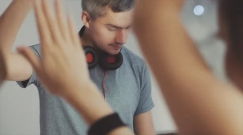 DJ mixing at console, people dancing. Concept about party, music and people Video stock 58352645