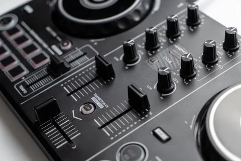 DJ mixing deck Controller connecting to Laptop and tablet using USB cable. Stock Photos