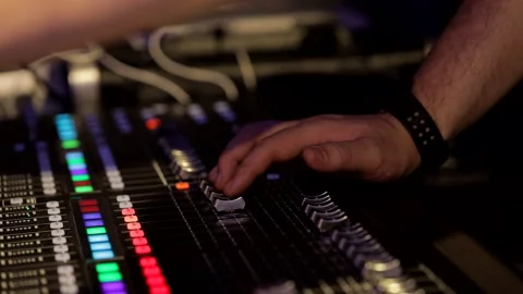 DJ is mixing music with deejay controller Stock Footage 282789538