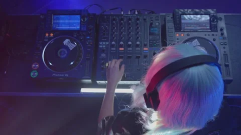 DJ mixing the tracks and dancing at nightclub 스톡 동영상 87156592