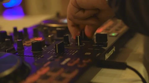 DJ mixing tracks on Numark controller at nightclub Izmir Turkey Dec 8, 2023 Stock-Footage 332116263