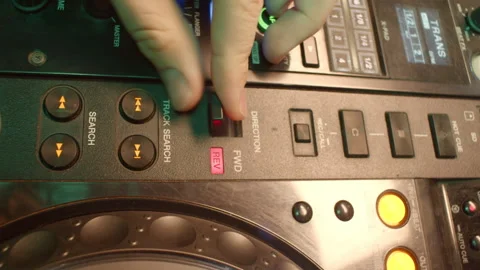 DJ moves switch of equalizer to fine-tune frequencies Видео 273615290