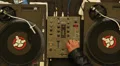 DJ in nightclub rocking to music grooving, two turntables spin HD Footage