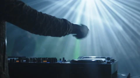 DJ operating on mixing desk Stock Footage 170257302