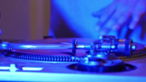 DJ Placing Vinyl On Turn Table And Placing Stylus To Begin Mixing Music Stock Footage 140238797