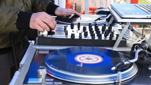 DJ Play Music, Scratching Vinyl Record On Turntable On Open Air Party. Video stock 107828624
