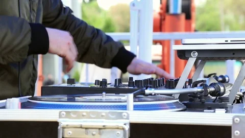 DJ Play Music, Scratching Vinyl Record On Turntable On Open Air Party. Video stock 107828659