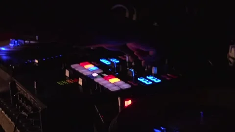 DJ playing and turning buttons Stock Footage 146334261