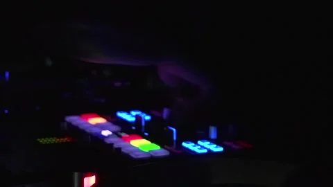 DJ playing and turning buttons Stock Footage 146334491