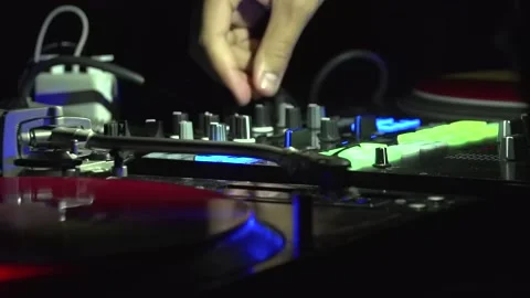 DJ playing on electronic keyboard Stock Footage 146334700