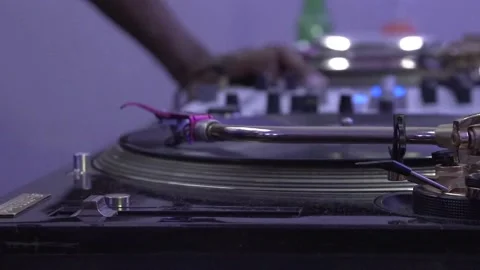 DJ playing electronic music in small club Stock Footage 146333849
