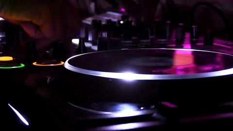 DJ playing on a mixing console at night Stock-Footage 105488521
