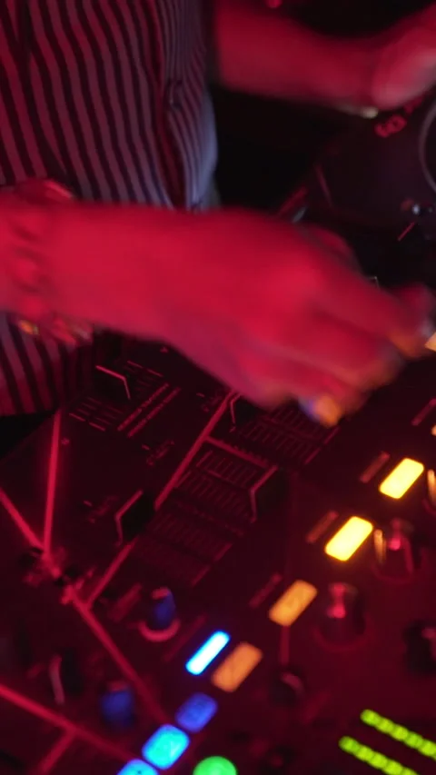 Dj Playing Music With Controller Console In Nightclub Ambience, Stock Footage 337902620