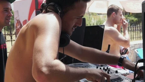 Dj Playing Pushing Knobs In A Console At A Summer Pool Party Stock Footage 102687998