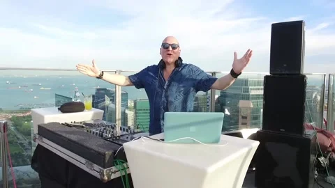 DJ playing on Rooftop in Singapore Stock Footage 131285095