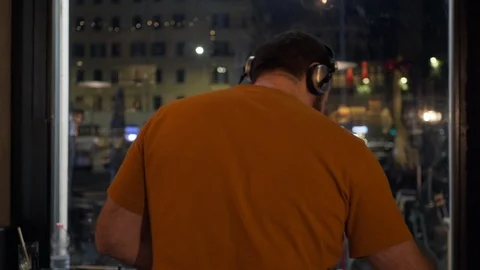 A dj plays in front of Rome's suburbs Stock Footage 102215481