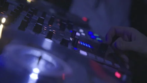 Dj plays on the remote Stock Footage 141513085
