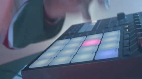 DJ presses buttons on equipment adjusting sound to perfection Stock Footage 271476763