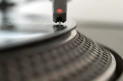 Dj record turntable. macro closeup of the needle on a 12 inch vinyl lp playin Stock Photos