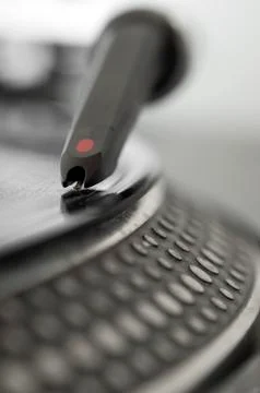 Dj record turntable. macro closeup of the needle on a 12 inch vinyl lp playin Stock Photos